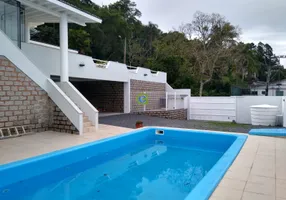 Foto 1 de Casa com 5 Quartos à venda, 600m² em Ponta de Baixo, São José
