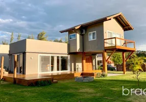 Foto 1 de Casa com 2 Quartos à venda, 108m² em Ibiraquera, Imbituba