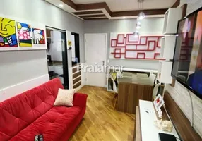 Foto 1 de Apartamento com 2 Quartos à venda, 58m² em Areia Branca, Santos
