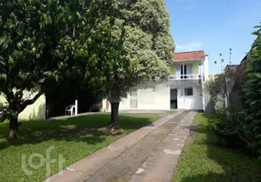 Foto 1 de Casa com 4 Quartos à venda, 125m² em Estância Velha, Canoas