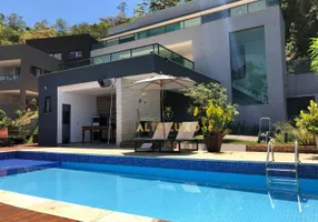 Foto 1 de Casa de Condomínio com 4 Quartos para venda ou aluguel, 485m² em Condominio Quintas do Sol, Nova Lima