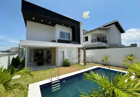 Foto 1 de Casa de Condomínio com 4 Quartos para venda ou aluguel, 270m² em Cidade Alpha, Eusébio