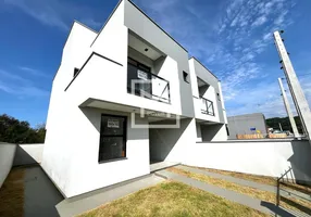 Foto 1 de Sobrado com 3 Quartos à venda, 91m² em Forquilhas, São José