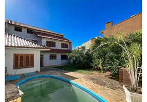 Foto 1 de Casa com 4 Quartos à venda, 213m² em Estância Velha, Canoas