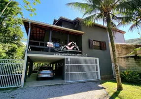 Foto 1 de Casa de Condomínio com 4 Quartos à venda, 266m² em Massaguaçu, Caraguatatuba