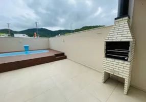 Foto 1 de Casa com 3 Quartos à venda, 104m² em Praia De Palmas, Governador Celso Ramos