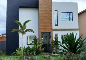 Foto 1 de Casa de Condomínio com 4 Quartos à venda, 198m² em Varge Grande Abrantes, Camaçari