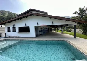 Foto 1 de Casa de Condomínio com 4 Quartos à venda, 550m² em Balneário Cidade Atlântica , Guarujá