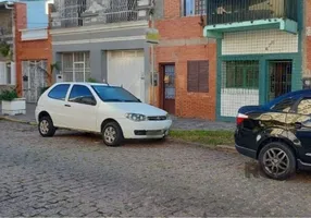 Foto 1 de Casa com 2 Quartos à venda, 89m² em Menino Deus, Porto Alegre