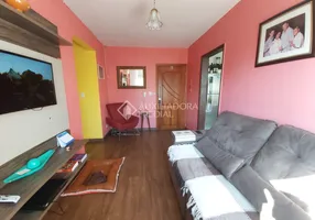 Foto 1 de Apartamento com 3 Quartos à venda, 60m² em Vila Nova, Porto Alegre