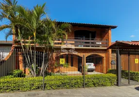 Foto 1 de Casa com 6 Quartos à venda, 405m² em Jardim Carvalho, Porto Alegre