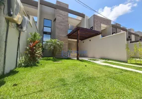 Foto 1 de Casa de Condomínio com 4 Quartos à venda, 128m² em Centro, Aquiraz