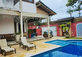 Foto 1 de Casa com 4 Quartos à venda, 379m² em Balneário Praia do Pernambuco, Guarujá