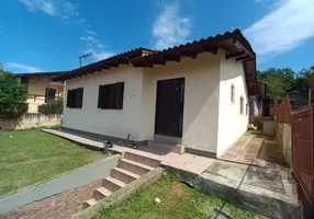 Foto 1 de Casa com 3 Quartos à venda, 104m² em Tarumã, Viamão