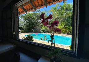 Foto 1 de Casa de Condomínio com 4 Quartos à venda, 267m² em Lagoa da Conceição, Florianópolis