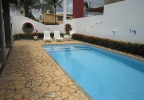 Foto 1 de Casa de Condomínio com 6 Quartos à venda, 300m² em Guarajuba, Camaçari