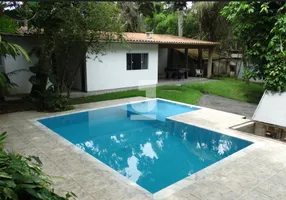 Foto 1 de Casa com 7 Quartos à venda, 550m² em Cidade Jardim, Caraguatatuba