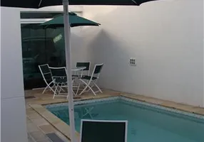 Foto 1 de Casa com 4 Quartos à venda, 280m² em Ponta da Praia, Santos