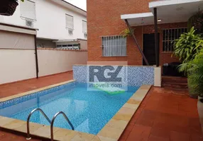 Foto 1 de Casa com 4 Quartos para venda ou aluguel, 250m² em Embaré, Santos