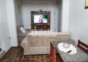 Foto 1 de Casa com 4 Quartos à venda, 150m² em Lidice, Uberlândia