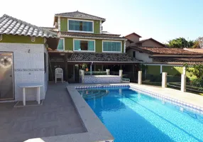 Foto 1 de Casa com 4 Quartos à venda, 170m² em Jardim Las Palmas, Guarujá