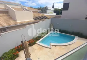 Foto 1 de Casa de Condomínio com 4 Quartos à venda, 390m² em Jardim Sul, Uberlândia