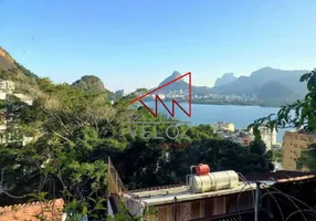 Foto 1 de Casa com 4 Quartos à venda, 354m² em Lagoa, Rio de Janeiro