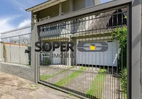 Foto 1 de Casa com 4 Quartos à venda, 212m² em Guarujá, Porto Alegre