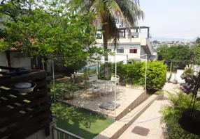 Foto 1 de Casa com 4 Quartos à venda, 256m² em Jardim Carioca, Rio de Janeiro