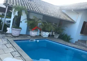 Foto 1 de Casa de Condomínio com 4 Quartos à venda, 320m² em Praia Comprida, São José