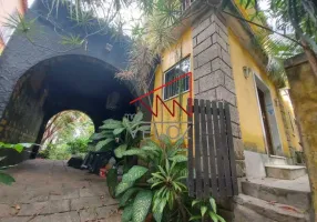 Foto 1 de Casa com 4 Quartos à venda, 384m² em Cosme Velho, Rio de Janeiro