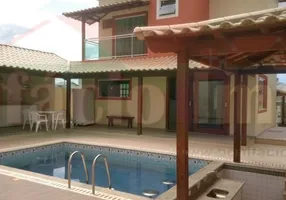 Foto 1 de Casa de Condomínio com 4 Quartos à venda, 180m² em Peró, Cabo Frio