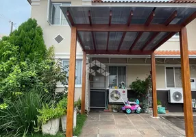 Foto 1 de Casa de Condomínio com 3 Quartos à venda, 118m² em Santa Fé, Porto Alegre