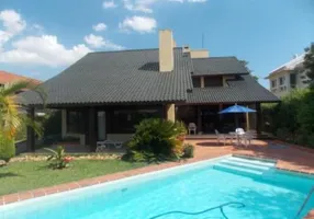 Foto 1 de Casa de Condomínio com 4 Quartos à venda, 450m² em Cavalhada, Porto Alegre