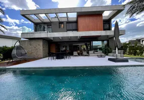 Foto 1 de Casa de Condomínio com 4 Quartos à venda, 300m² em Condominio Enseada Lagos de Xangri La, Xangri-lá