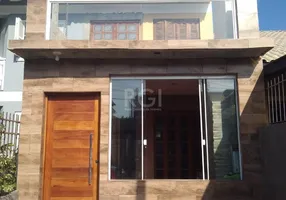 Foto 1 de Casa com 2 Quartos à venda, 72m² em Hípica, Porto Alegre