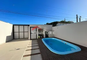 Foto 1 de Sobrado com 3 Quartos à venda, 130m² em Tabuleiro, Camboriú