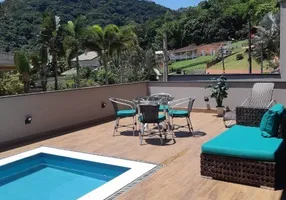 Foto 1 de Casa de Condomínio com 4 Quartos à venda, 230m² em Lagoinha, Ubatuba