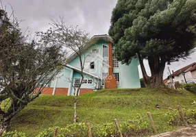 Foto 1 de Casa de Condomínio com 4 Quartos à venda, 206m² em Alto do Capivari, Campos do Jordão