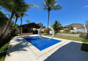 Foto 1 de Casa de Condomínio com 4 Quartos à venda, 334m² em Balneário Praia do Pernambuco, Guarujá