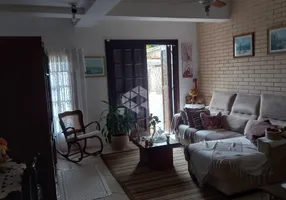 Foto 1 de Casa com 3 Quartos à venda, 250m² em Santa Fé, Porto Alegre