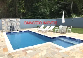 Foto 1 de Casa de Condomínio com 4 Quartos para alugar, 193m² em Lagoinha, Ubatuba