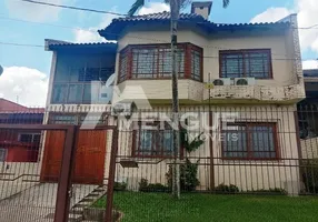 Foto 1 de Casa com 3 Quartos à venda, 253m² em Santa Fé, Porto Alegre