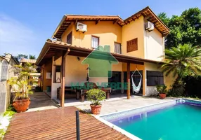 Foto 1 de Casa de Condomínio com 4 Quartos à venda, 200m² em Mar Verde II, Caraguatatuba