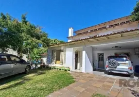 Foto 1 de Casa com 4 Quartos à venda, 306m² em Espiríto Santo, Porto Alegre