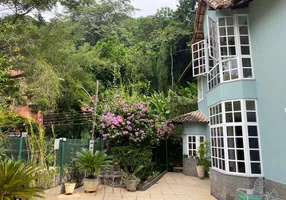 Foto 1 de Casa com 5 Quartos à venda, 350m² em Cosme Velho, Rio de Janeiro