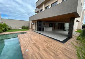 Foto 1 de Casa de Condomínio com 5 Quartos à venda, 443m² em Jardins Italia, Goiânia