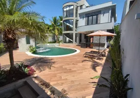 Foto 1 de Casa de Condomínio com 6 Quartos para venda ou aluguel, 900m² em Barra da Tijuca, Rio de Janeiro