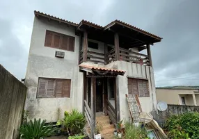 Foto 1 de Casa com 6 Quartos à venda, 399m² em Partenon, Porto Alegre