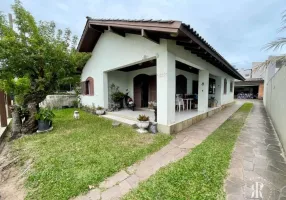 Foto 1 de Casa com 5 Quartos à venda, 112m² em Centro, Tramandaí